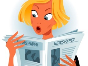 Woman reading newspaper